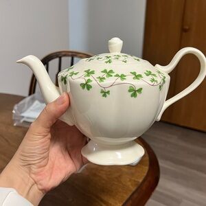 Elegant Teapot with Green Clover Design